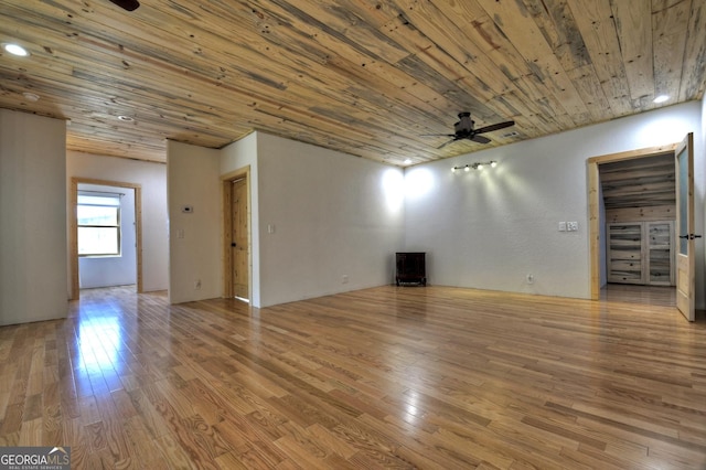unfurnished living room featuring a ceiling fan, wood finished floors, wood ceiling, and recessed lighting