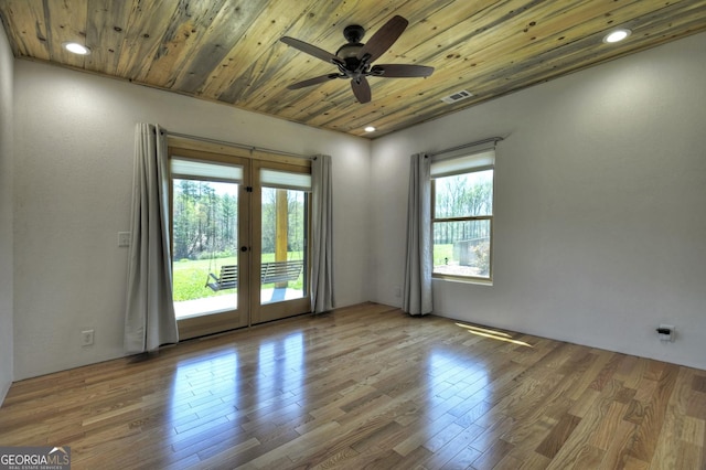 unfurnished room with french doors, ceiling fan, wood finished floors, wooden ceiling, and recessed lighting