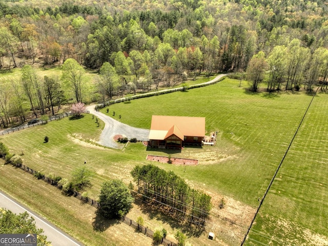 overview of rural landscape with a heavily wooded area