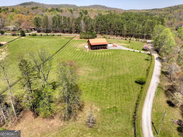 overview of rural landscape with a heavily wooded area