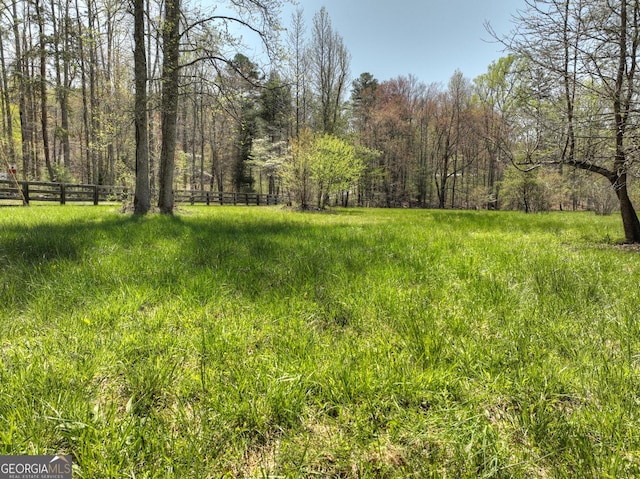 view of yard featuring fence