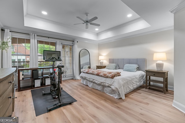 3636 Habersham Rd NW Unit 2101, Atlanta, GA 30305 - bedroom with a tray ceiling, crown molding, light wood finished floors, baseboards, and ceiling fan