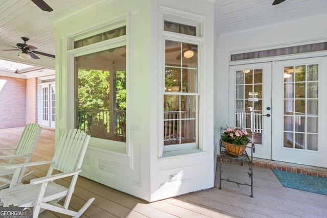 doorway to outside featuring ceiling fan, wood-type flooring, french doors, and ornamental molding