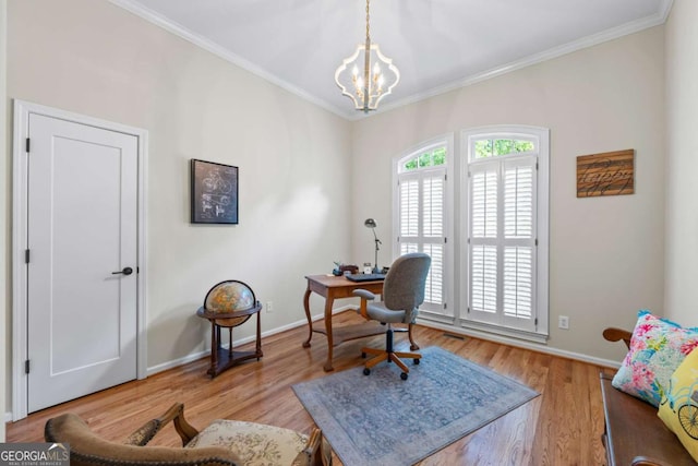 home office featuring ornamental molding, a chandelier, baseboards, and light wood-style flooring