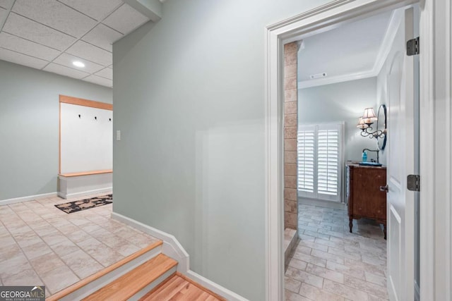 corridor featuring baseboards and recessed lighting