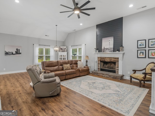 111 Walnut Ln, Williamson, GA 30292 - living room featuring a ceiling fan, a stone fireplace, wood finished floors, vaulted ceiling, and recessed lighting