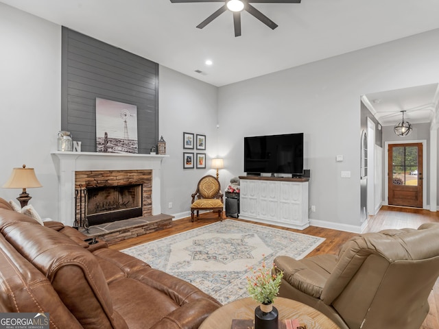 111 Walnut Ln, Williamson, GA 30292 - living room featuring ceiling fan, wood finished floors, a fireplace, baseboards, and recessed lighting