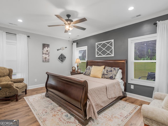 111 Walnut Ln, Williamson, GA 30292 - bedroom with wood finished floors, crown molding, recessed lighting, baseboards, and a ceiling fan