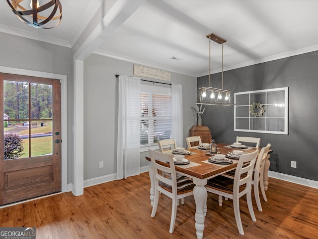 111 Walnut Ln, Williamson, GA 30292 - dining room with ornamental molding, wood finished floors, and baseboards