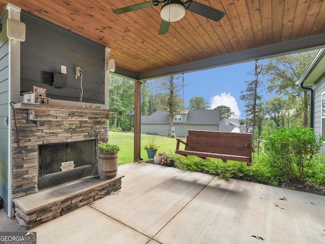 111 Walnut Ln, Williamson, GA 30292 - view of patio featuring an outdoor stone fireplace and ceiling fan