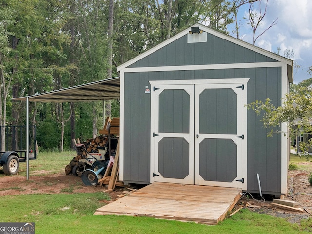 111 Walnut Ln, Williamson, GA 30292 - view of shed featuring a carport