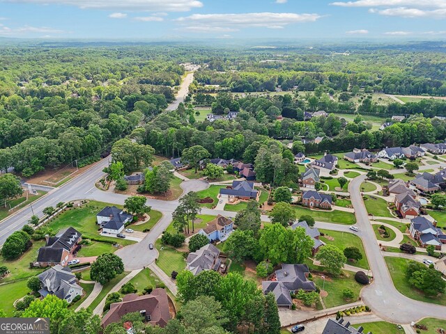 771 James Cir, Lawrenceville, GA 30046 - aerial perspective of suburban area with a heavily wooded area