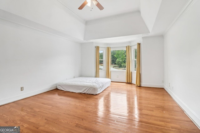 771 James Cir, Lawrenceville, GA 30046 - bedroom with light wood-style flooring, ornamental molding, ceiling fan, and baseboards