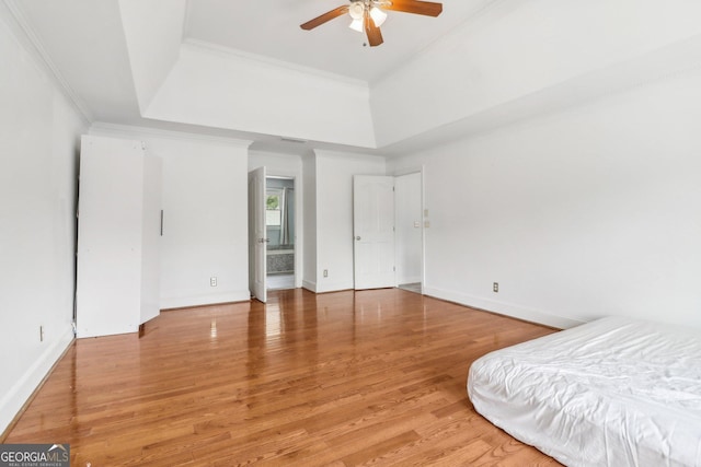 771 James Cir, Lawrenceville, GA 30046 - bedroom featuring crown molding, light wood-style flooring, baseboards, and ceiling fan