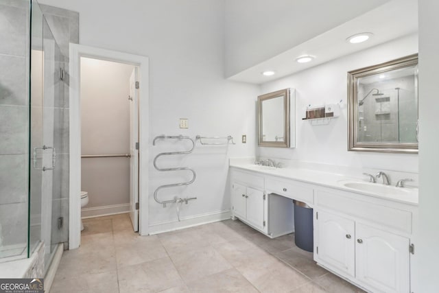 771 James Cir, Lawrenceville, GA 30046 - full bath with a shower stall, toilet, double vanity, baseboards, and tile patterned floors