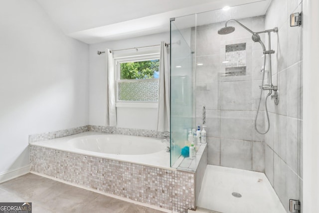 771 James Cir, Lawrenceville, GA 30046 - bathroom with a shower stall and a garden tub
