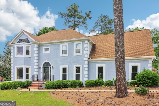 771 James Cir, Lawrenceville, GA 30046 - victorian-style house with stucco siding and a shingled roof
