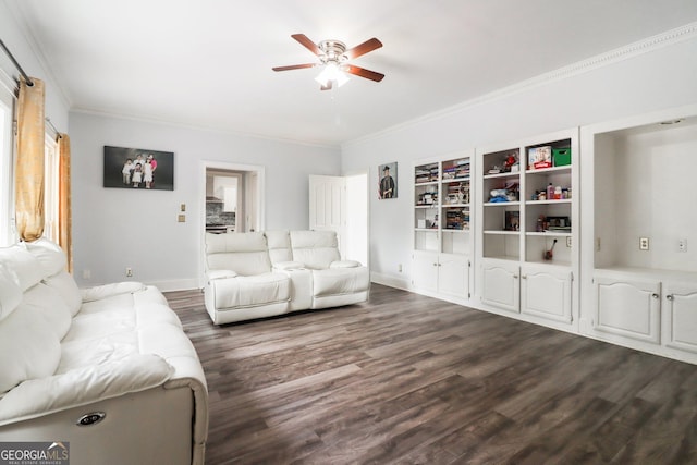 771 James Cir, Lawrenceville, GA 30046 - living area featuring ceiling fan, crown molding, dark wood-type flooring, and baseboards