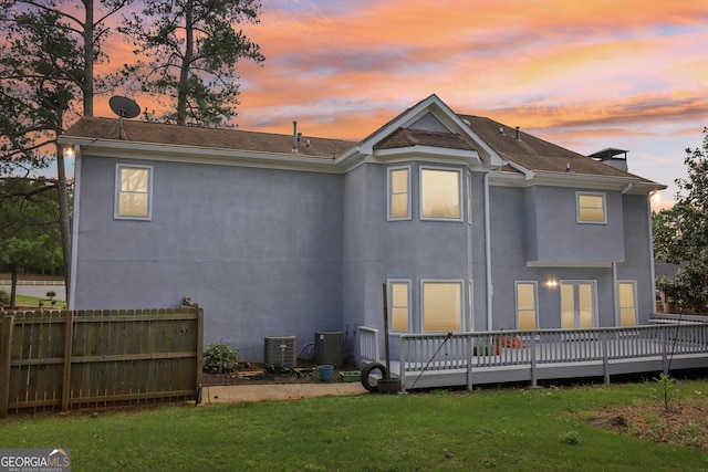 771 James Cir, Lawrenceville, GA 30046 - rear view of property featuring a deck and stucco siding