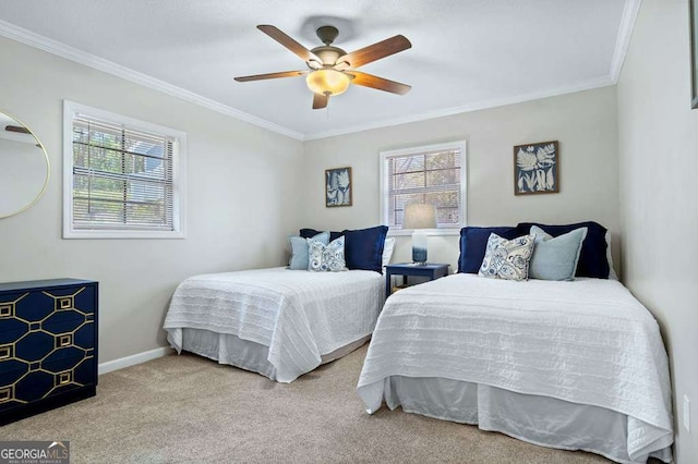 bedroom with multiple windows, ornamental molding, carpet, baseboards, and a ceiling fan