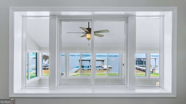 entryway with a ceiling fan