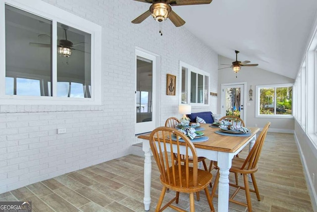 sunroom with lofted ceiling