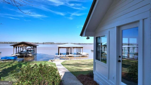 dock featuring a water view and boat lift