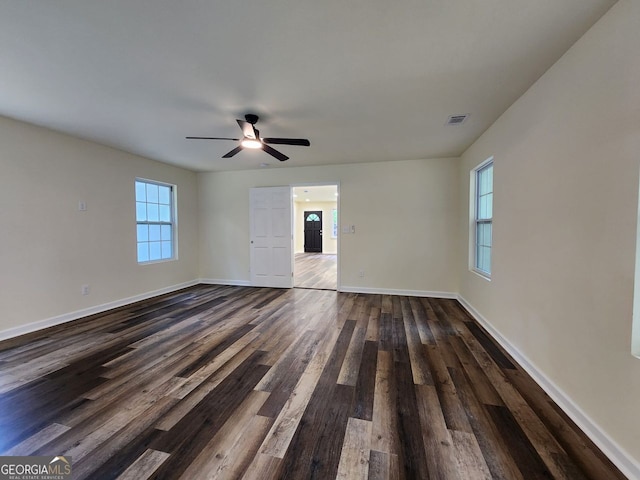 188 Oak Dr, Atlanta, GA 30354 - empty room featuring plenty of natural light, dark wood-style flooring, and a ceiling fan