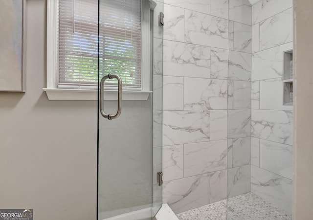 full bath featuring a stall shower