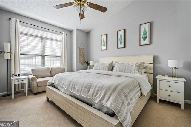 508 Vinings Forest Ct SE, Smyrna, GA 30080 - carpeted bedroom with a textured ceiling, baseboards, vaulted ceiling, and ceiling fan
