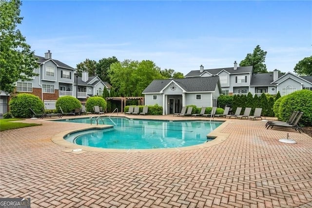 508 Vinings Forest Ct SE, Smyrna, GA 30080 - community pool featuring a residential view and a patio area