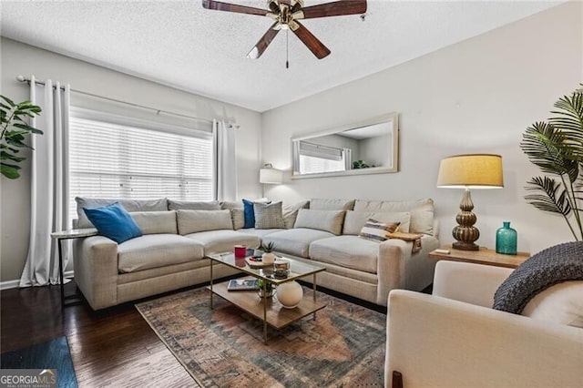 508 Vinings Forest Ct SE, Smyrna, GA 30080 - living area with ceiling fan, dark wood finished floors, a textured ceiling, and baseboards