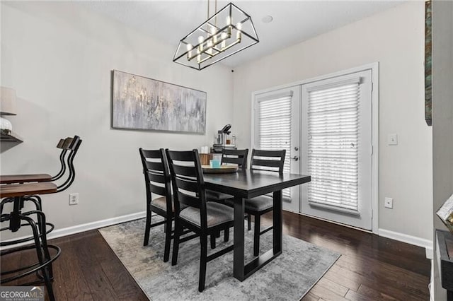 508 Vinings Forest Ct SE, Smyrna, GA 30080 - dining space featuring hardwood / wood-style flooring, baseboards, a chandelier, and french doors