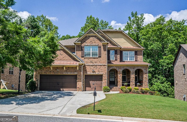 view of front of home with a front yard, concrete driveway, brick siding, a porch, and an attached garage