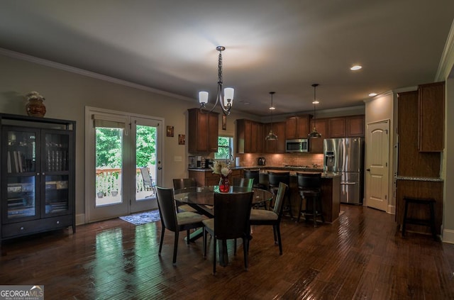 dining area with a chandelier, dark wood-style flooring, recessed lighting, and ornamental molding