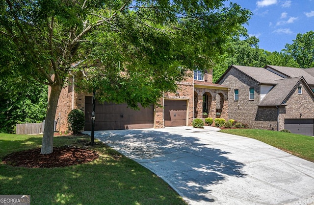 view of front of property featuring concrete driveway, brick siding, and a garage