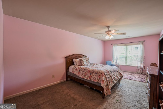 bedroom featuring carpet flooring, ceiling fan, and baseboards