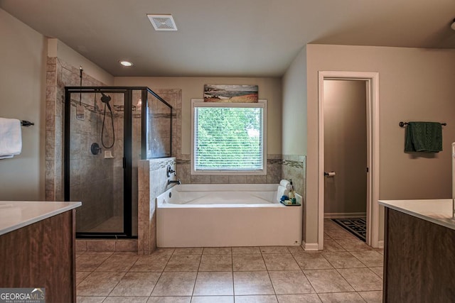 full bathroom with vanity, tile patterned floors, and a shower stall