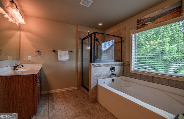 full bathroom with vanity, tile patterned floors, a stall shower, and a bath