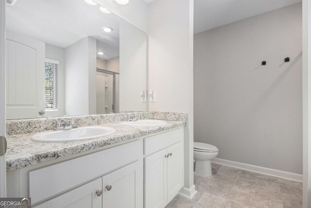458 Ajo Way, Dallas, GA 30157 - full bathroom featuring double vanity and a shower with shower door
