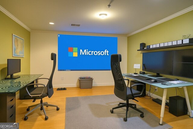 office featuring wood finished floors, ornamental molding, baseboards, and recessed lighting