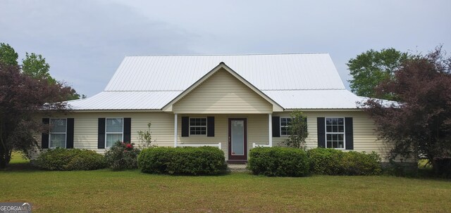 762 Old Mcleod Bridge Rd, Adrian, GA 31002 - view of front of home featuring a front yard and metal roof