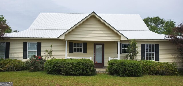 762 Old Mcleod Bridge Rd, Adrian, GA 31002 - view of front of house with a front yard and metal roof