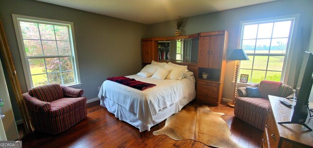 762 Old Mcleod Bridge Rd, Adrian, GA 31002 - bedroom featuring wood finished floors and baseboards