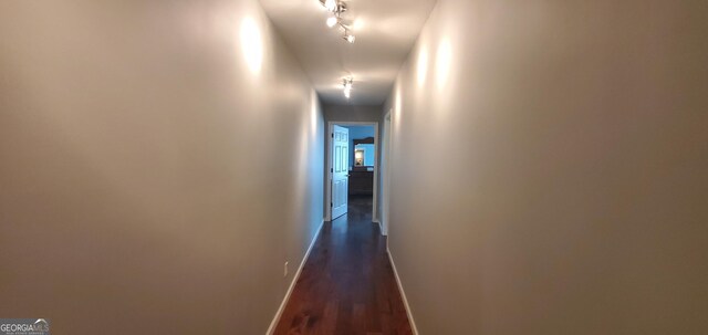 762 Old Mcleod Bridge Rd, Adrian, GA 31002 - hall with baseboards and dark wood-style floors