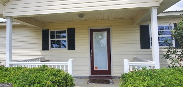 762 Old Mcleod Bridge Rd, Adrian, GA 31002 - view of exterior entry featuring a porch