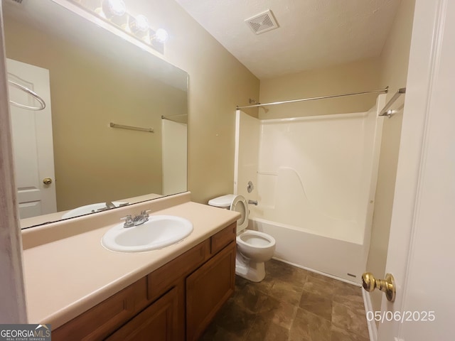 full bath with vanity, toilet, and shower / washtub combination