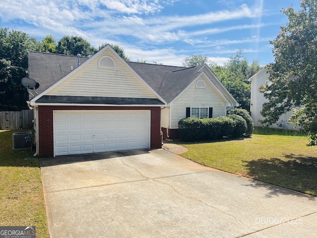 view of front facade with brick siding, a front lawn, and driveway