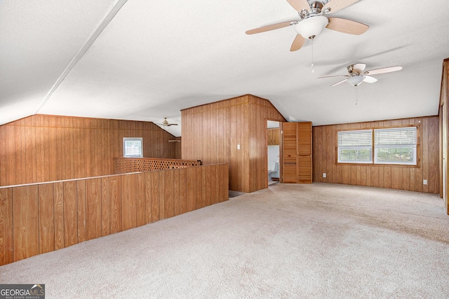 1795 Hutcheson Ferry Rd, Whitesburg, GA 30185 - bonus room with lofted ceiling, wooden walls, carpet flooring, ceiling fan, and a textured ceiling