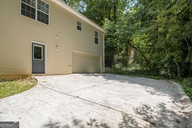 175 Hearth Way, Fairburn, GA 30213 - view of property exterior with a garage and concrete driveway